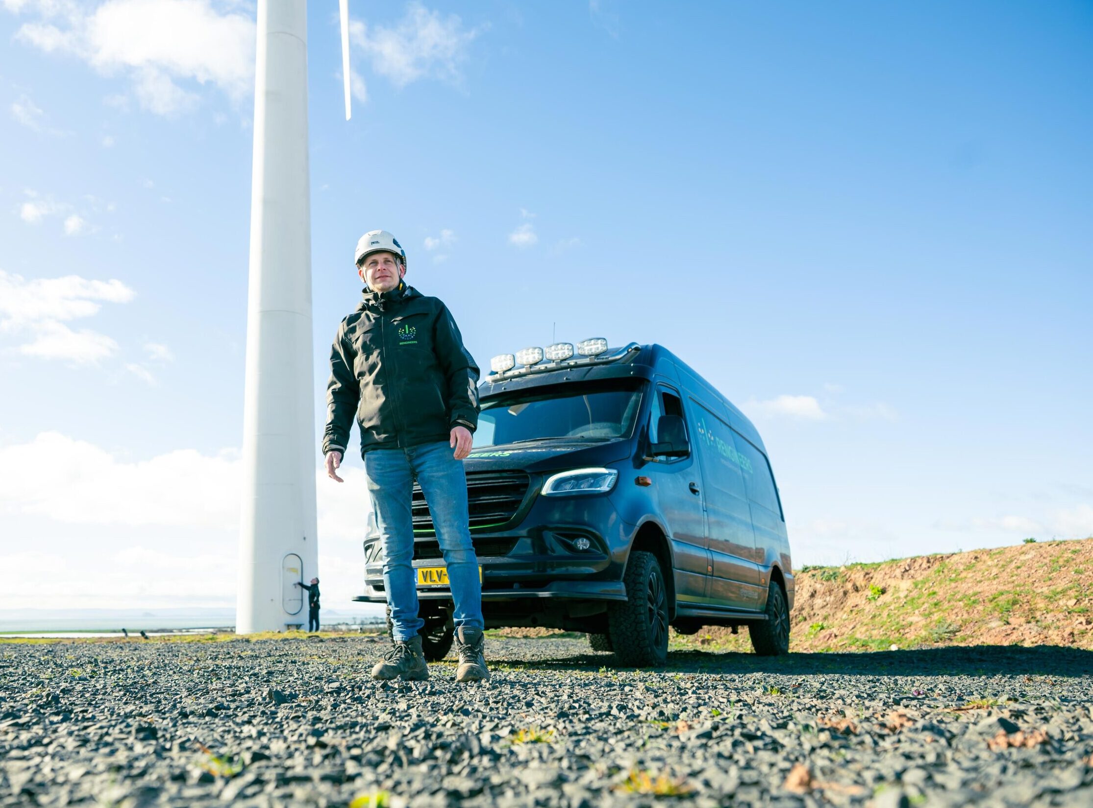 Rengineers engineer working on a wind turbine